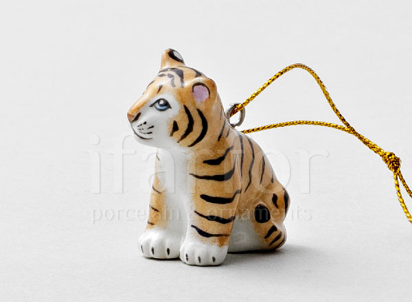 Christmas tree toy Tiger cub sitting