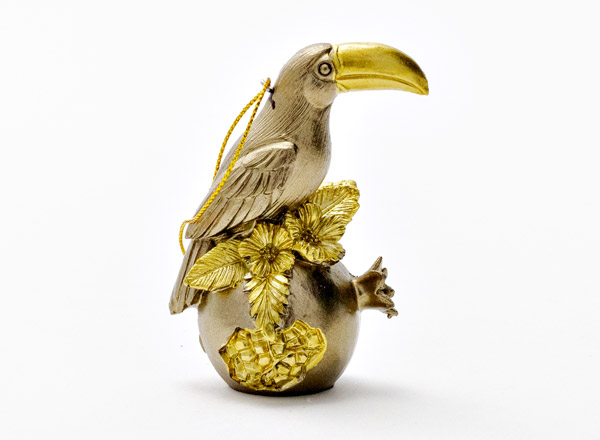 Christmas tree toy Toucan on a golden garnet