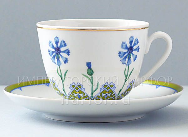 Cup and saucer tea Flowers and berries of Russia. Sky-blue bluet Spring